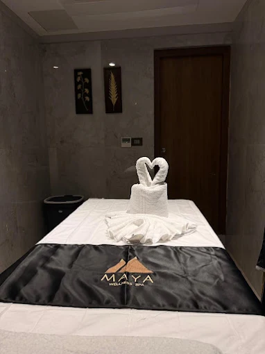 Signature swan-towel art in candlelit suite